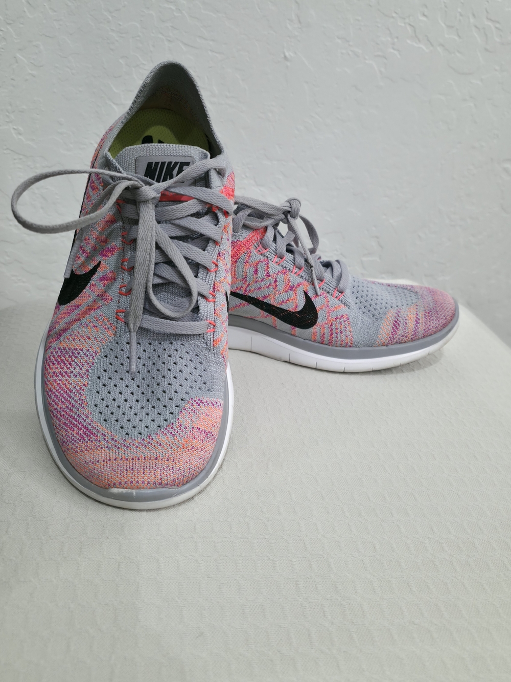 Nike Women’s Gray & Pink Flyknit Training Sneakers